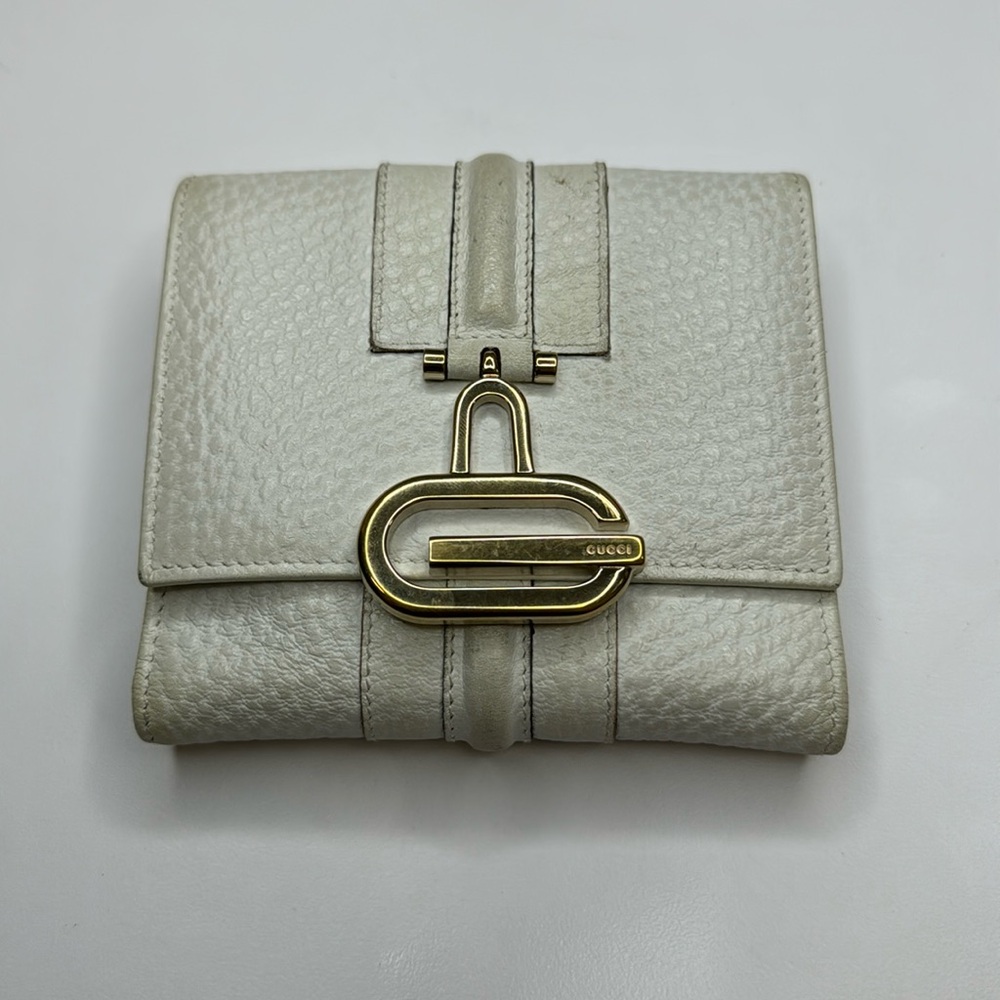 10874 Gucci